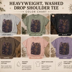 May include: A color chart for a heavyweight, washed drop shoulder tee featuring six t-shirts in light gray, light green, black, coffee, peach pink, and taro. Each shirt displays a graphic of a tiger in a forest setting with a moon above.