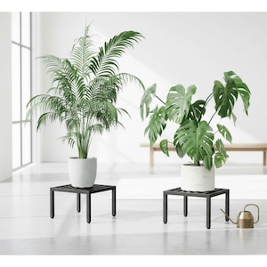 May include: A set of three ceramic mugs with a speckled, matte finish. The mugs are in shades of cream, light gray, and dark gray. Each mug has a simple, minimalist design, suitable for coffee or tea.