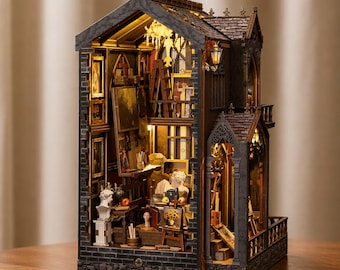 Rincón de lectura del estudio del artista: Diorama del taller de pintura en miniatura con luz LED.