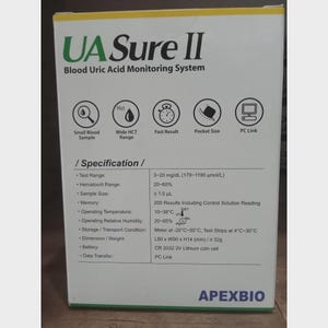 May include: A white box with green text reading "UA Sure II Blood Uric Acid Monitoring System." The box includes icons and specifications such as test range, sample size, and operating temperature. The brand name "APEXBIO" is printed at the bottom.