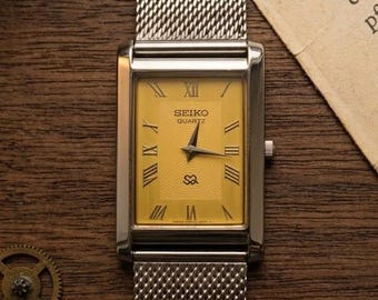Vintage Seiko tankhorloge, wijzerplaat met Romeinse cijfers, slank roestvrijstalen quartz dresswatch