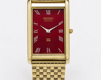 Vintage Seiko gouden tankhorloge, rode Romeinse wijzerplaat | Slank quartz-dresshorloge gerenoveerd