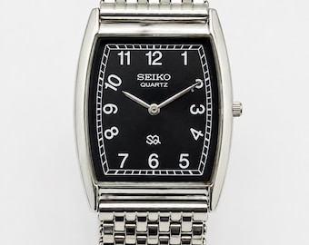 Vintage Seiko-kwartshorloge voor heren | Roestvrijstalen polshorloge met zwarte wijzerplaat, gereviseerd