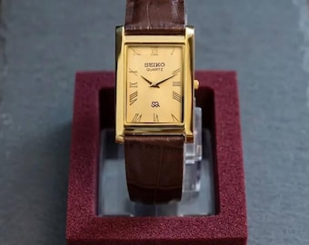 Vintage Seiko tankhorloge vergulde leren band minimalistisch jaren 90 gerenoveerd