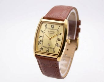 Vintage Seiko Barrel-tankhorloge | Herenhorloge met gouden wijzerplaat | Leren band: