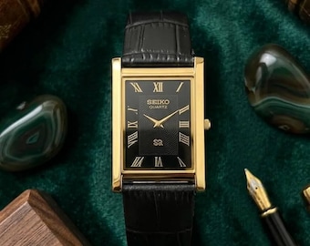 Orologio da uomo vintage Seiko Tank placcato oro, quadrante nero, al quarzo.