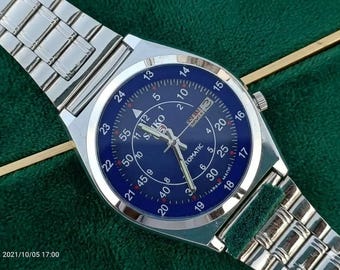 Vintage Seiko 5 automatisch herenhorloge 7009 blauwe wijzerplaat gerestaureerd