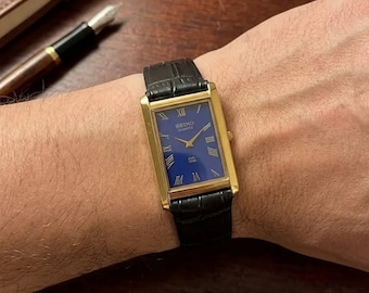 Vintage Seiko tankhorloge blauwe Romeinse wijzerplaat | Slanke quartz-dresswatch | Echt leren band