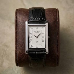 Orologio vintage Seiko Tank da uomo al quarzo, rettangolare, con quadrante bianco.