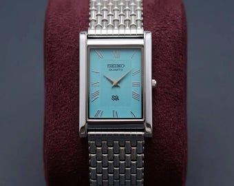 Vintage Seiko tankhorloge, hemelsblauwe wijzerplaat, klassieke unisex-jurk met kwartsuurwerk