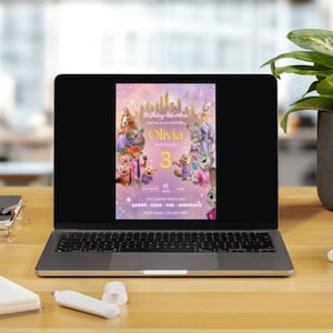 May include: A laptop screen displaying a Zootopia-themed birthday invitation for Olivia's 3rd birthday. The digital design features characters from the movie, a golden city skyline, and text including the date, time, location, and RSVP information.