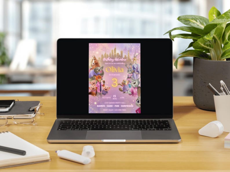 May include: A laptop screen displaying a Zootopia-themed birthday invitation for Olivia's 3rd birthday. The digital design features characters from the movie, a golden city skyline, and text including the date, time, location, and RSVP information.