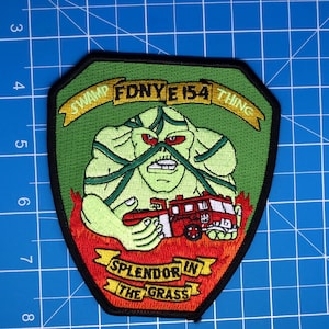 Parche de la Cosa del Pantano del Motor 154 del Departamento de Bomberos de la Ciudad de Nueva York (FDNY)