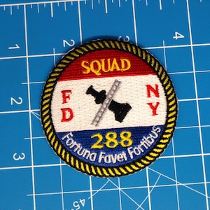 May include: A rustic wooden sign with the text "Welcome" in a handwritten style. The sign is painted white with a distressed finish, and features a decorative floral element in the corner. The background is a blurred image of a wooden surface.