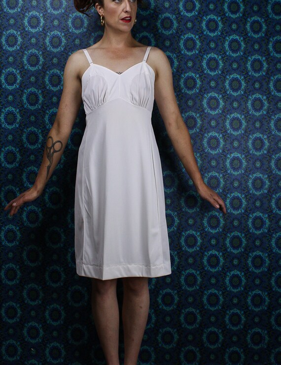 white knee length slip