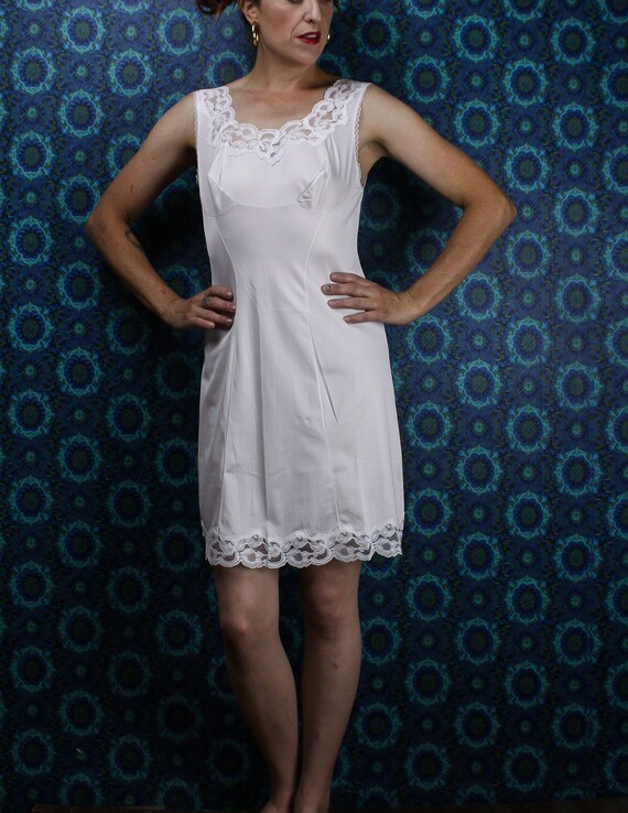 white knee length slip