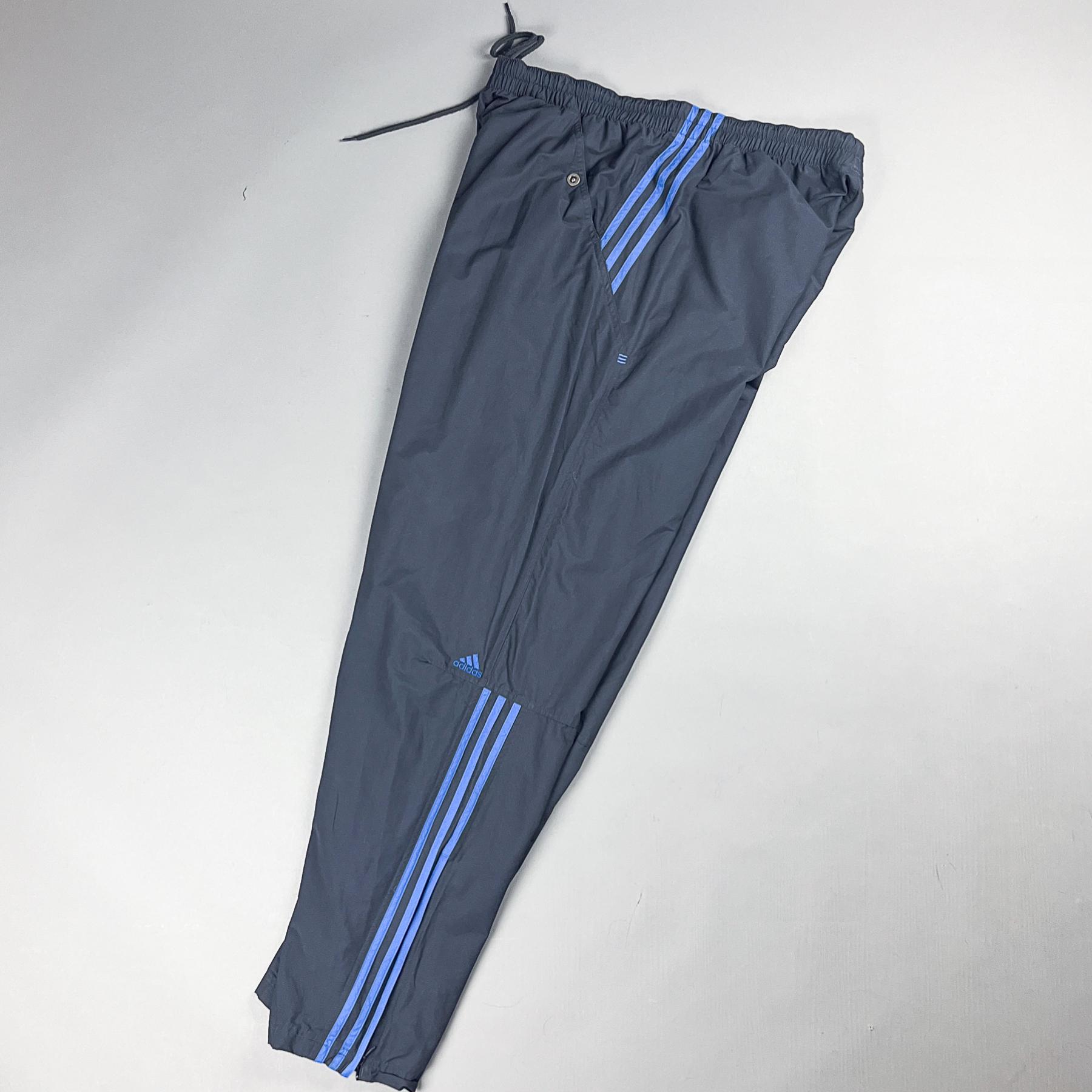 Adidas track pants blue stripe on sale