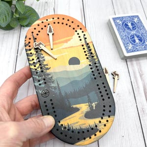 Colorful Wilderness Mini Travel Cribbage Boards – Fish, Mountains, Deer, Lighthouse & Ocean Designs – Game for Camping, Travel, and Gifts