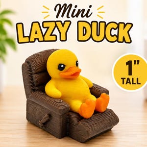 May include: A yellow duck figurine with orange feet and beak sitting in a brown textured armchair. The text Mini LAZY DUCK is displayed above the figure, and a yellow circle indicates the item is 1 inch tall.