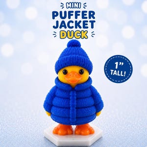 May include: A miniature yellow duck figurine wearing a blue knit hat and puffer jacket. The duck has orange feet and a beak. The text "MINI PUFFER JACKET DUCK" is above the duck. The figurine is 1 inch tall.