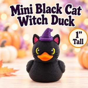 May include: A small black duck figurine with cat ears, wearing a purple witch hat. The duck has bright yellow eyes and an orange beak. The text "Mini Black Cat Witch Duck" and "1" Tall" are visible in the image, indicating a height of 1 inch.