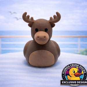 May include: A set of three ceramic mugs with a speckled, cream-colored glaze. Each mug features a different hand-painted floral design in shades of blue, green, and yellow. The mugs have a simple, modern shape.