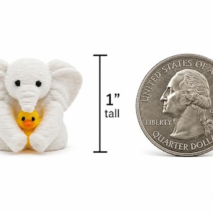 Mini bear towel animal holding a heart, 1-inch 3D printed teddy bear collectible by Florida Cruise Ducks. Tiny white towel bear with red heart for cruise duck hiding, Valentine's gifts, party favors, miniature collectors, and cruise gifts.