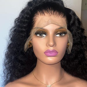 May include: A set of three ceramic mugs with a speckled, matte finish. The mugs are in cream, light grey, and dark grey. Each mug has a simple, minimalist design, ideal for coffee or tea.