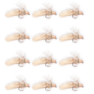 May include: A dozen artificial fishing flies. Each fly features a cream-colored body, a copper-colored head, and a curved hook. The flies have feathery, light brown accents, and are arranged on a white background.