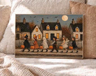 May include: A rectangular wall art print depicting a nighttime Halloween scene with five children in costumes walking past white houses. Each child carries a small orange jack-o'-lantern bucket. A full moon shines in the dark sky above the houses.