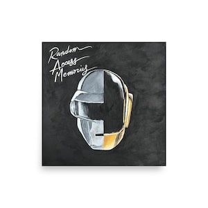 May include: A square print featuring a stylized illustration of a Daft Punk helmet, split vertically into silver and gold sections. The words "Random Access Memories" are written in white script across the top left of the image. The background is a dark gray.