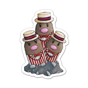 May include: A sticker featuring three cartoon characters resembling moles. They wear matching outfits: red and white striped vests, red bow ties, and cream-colored hats with red and blue bands. They stand on a gray rock base.