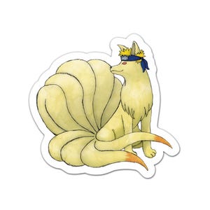 May include: A sticker featuring a cartoon fox with nine tails. The fox is yellow with a blue headband and orange-tipped paws. The sticker has a white border and is set against a white background.