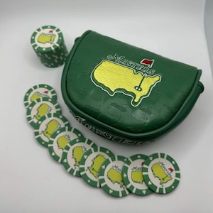 May include: A set of three ceramic mugs with a speckled, matte finish. The mugs are in shades of cream, light gray, and dark gray. Each mug has a simple, modern design and a rounded handle. Perfect for coffee or tea.