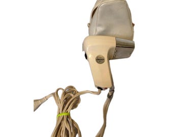 Secador de pelo de viaje Noble vintage de los años 60 con estuche, fabricado en Japón.