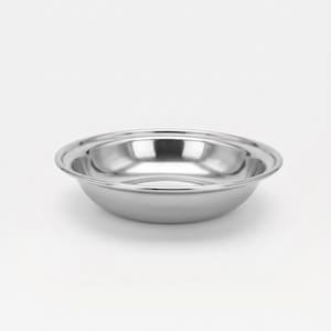 May include: A shallow, circular bowl made of polished stainless steel with a smooth, reflective surface. The bowl features a wide, rounded rim that curves outward, creating a distinct edge around the top perimeter of the metallic vessel.