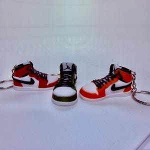 May include: A rustic wooden sign with the text "Welcome to our home" in a handwritten style. The sign features a distressed finish and a simple, inviting design, perfect for entryway decor.