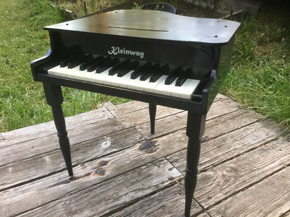 childs wooden piano