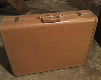 taperlite vintage luggage