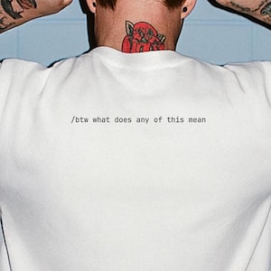 Por cierto, ¿qué significa todo esto? Codificación de camisetas / Humor de comandos de Claude