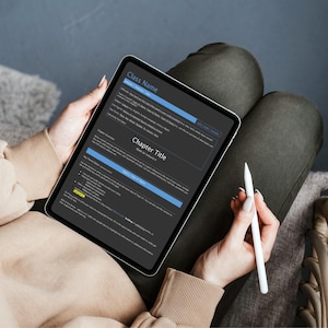 May include: A black tablet displaying a digital document with the header Class Name and Chapter Title. The screen shows structured text fields, bullet points, and blue highlighted sections. A white stylus is held alongside the tablet device.