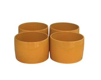 Set van 4 mosterdgele servetringen
