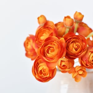 10.5" Faux Peachy Orange Ranunculus Stem Bundle