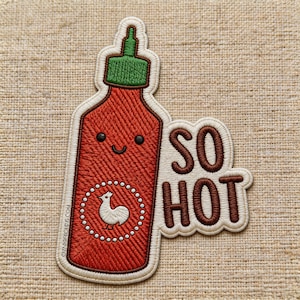 May include: Embroidered patch featuring a smiling red sriracha bottle with a green cap and a white chicken emblem. The words "SO HOT" are embroidered in brown. The patch has a white border.