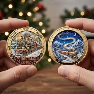 May include: Two circular gold-toned medallions featuring detailed train illustrations. The left medallion shows a steam locomotive with the text "CHRISTMAS EXPRESS" in red. The right medallion depicts a train traveling through a snowy mountain landscape.