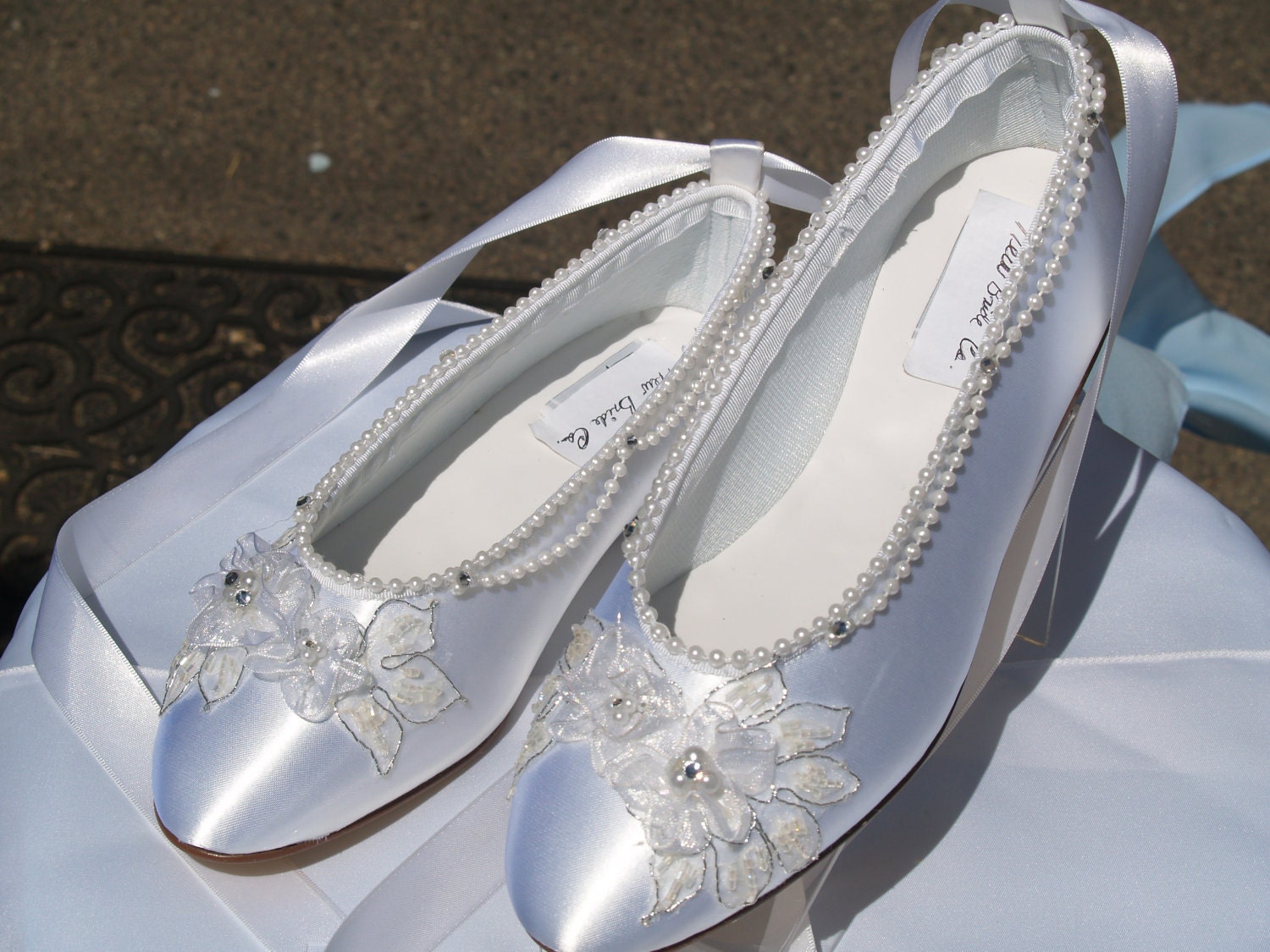 white satin ballet slippers