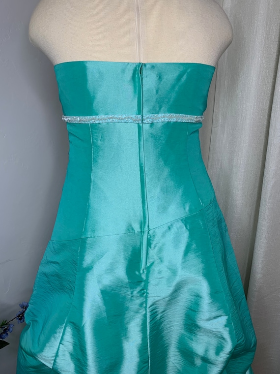 Aqua green straight cut sequined dress.