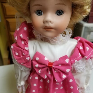 PORCELAIN Doll vintage 90&#39;s with pink polka dot dress, blonde curly hair porcelain doll