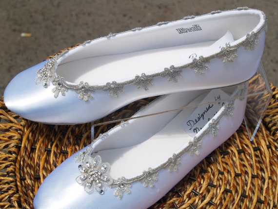 white and silver flats