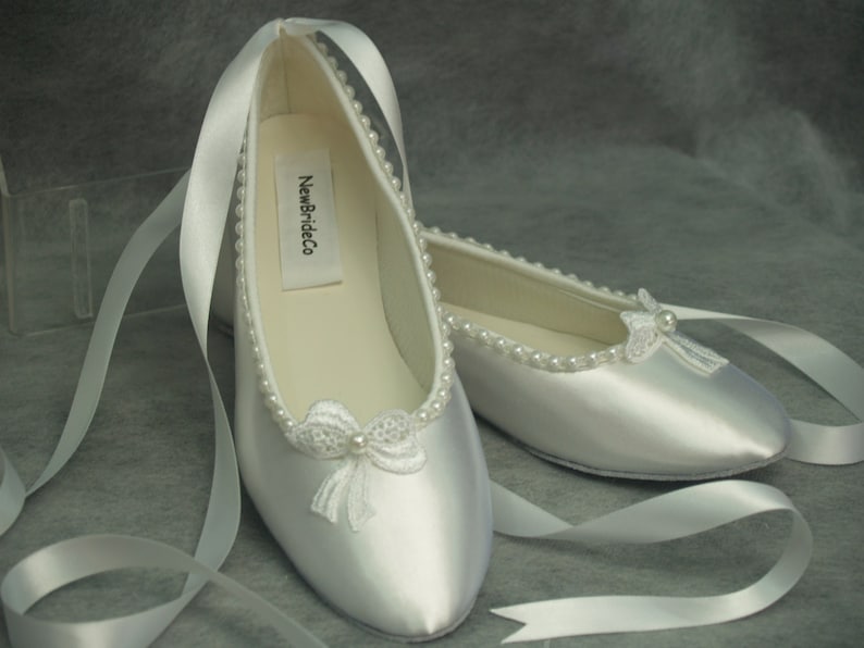 Vintage Wedding Shoes, Flats, Boots, Heels White ballet style slippers with lace bow & pearls Wedding Bridal shoes white or Ivory Romantic Simple Closed Toe FlatsLace Up Ribbon $118.00 AT vintagedancer.com